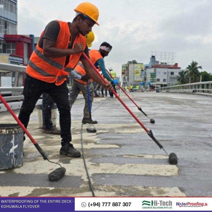 Hi-Tech Concrete Solutions team applying waterproofing on Kohuwala Flyover deck Sri Lanka